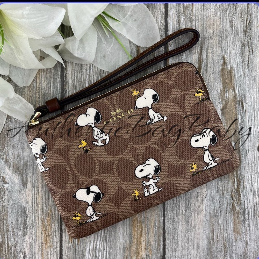 Coach X Peanuts Corner Zip Wristlet In Signature Canvas With Snoopy Print Wallet